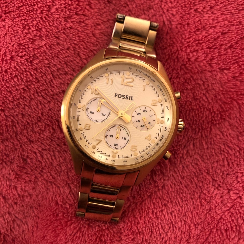 Women’s gold fossil watch